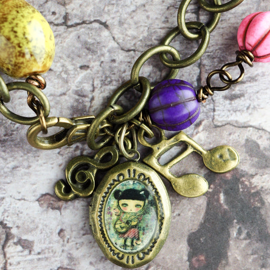 The musician, original bracelet handmade jewelry by Danita. She sings a sorrowful song while her guitar gently weeps.