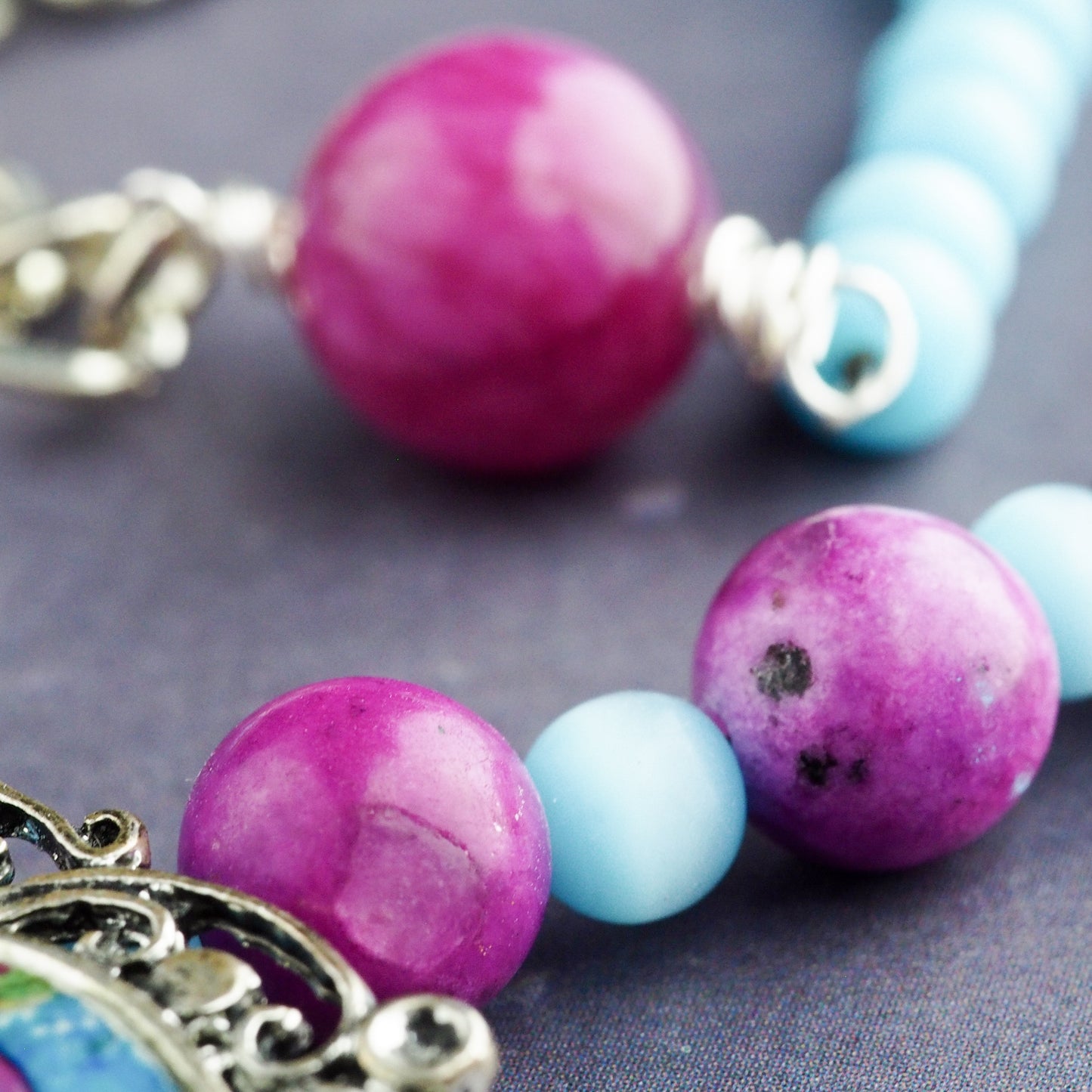 Octopus mermaid girl necklace by Danita. One of a kind jewelry with faceted glass beads.