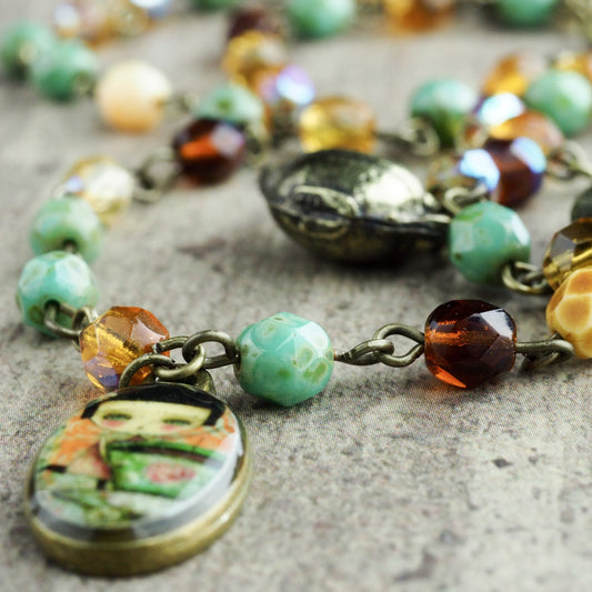 Original mixed materials necklace by Danita Art. The Tea Fairy, a whimsical mixed media illustration.