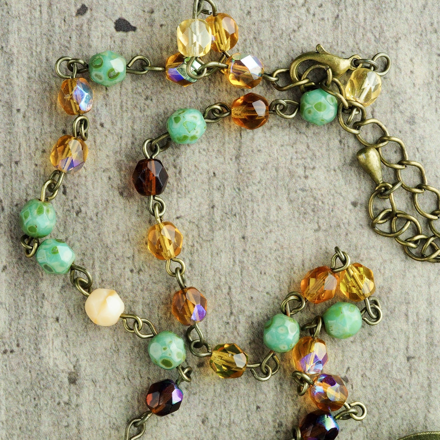 Original mixed materials necklace by Danita Art. The Tea Fairy, a whimsical mixed media illustration.