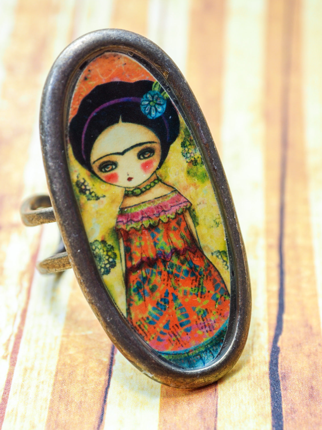 FRIDA IN AN ORANGE DRESS - Frida with flowers on an original ring by Danita, Jewelry by Danita Art