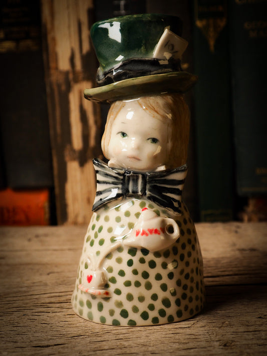 Flower pot container ceramic figure inspired by Alice in Wonderland made by Idania Salcido, the mixed media artist and ceramist behind Danita Art. Earth clay is hand sculpted and glazed and kiln fired to create a ceramic home decor heirloom figurine. Each unique art piece is a one of a kind fine pottery artwork.