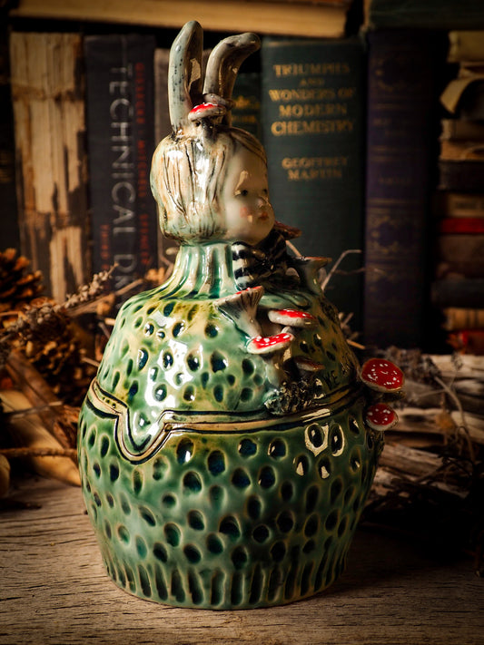 Alice the rabbit vintage ceramic figure inspired by Alice in Wonderland made by Idania Salcido, the mixed media artist and ceramist behind Danita Art. Earth clay is hand sculpted and glazed and kiln fired to create a ceramic home decor heirloom figurine. Each unique art piece is a one of a kind fine pottery artwork.