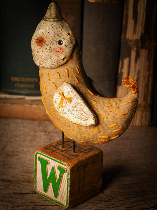 An adorable hand made porcelain and fabric fine art doll by Idania Salcido Danita Art. Perfect to hang as a delicate Christmas tree ornament, this fired ceramic mixed media artwork is unique. Each doll has a beautiful hand sculpted porcelain ceramic face and hand dyed fabric body with vintage accessories as home decor.