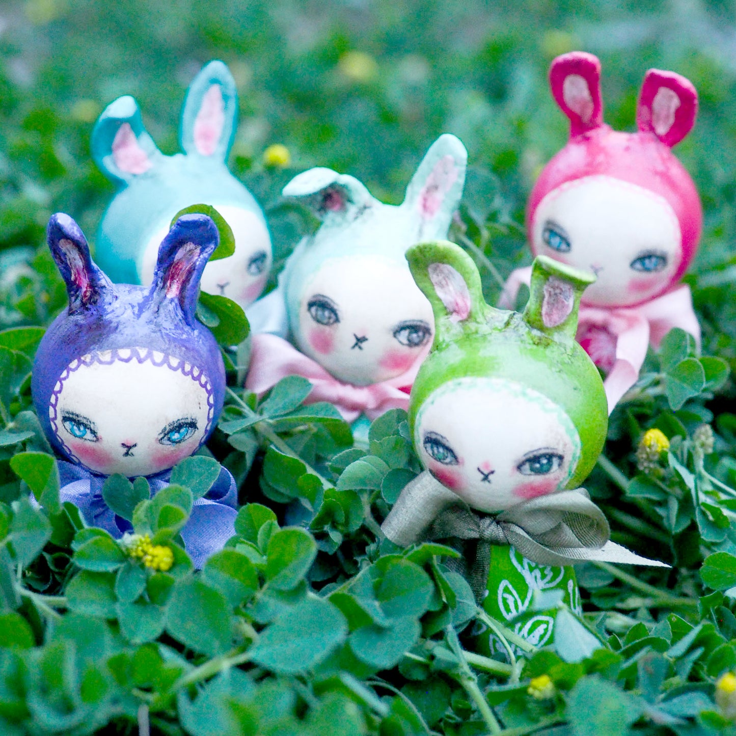 A kokeshi art doll handmade by Danita. Easter bunny rabbits with paper clay sculpted ears want to live with you this Spring time!