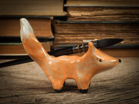 Original handmade ceramic artist color pencil brush holder red fox by Idania Salcido, Danita Art. Unique ceramic art designed and hand built Idania Salcido beautiful handmade touch to any artist's studio with handmade glazed ceramic good for watercolors acrylics inks and oil paints. Clean with water or mineral spirits.