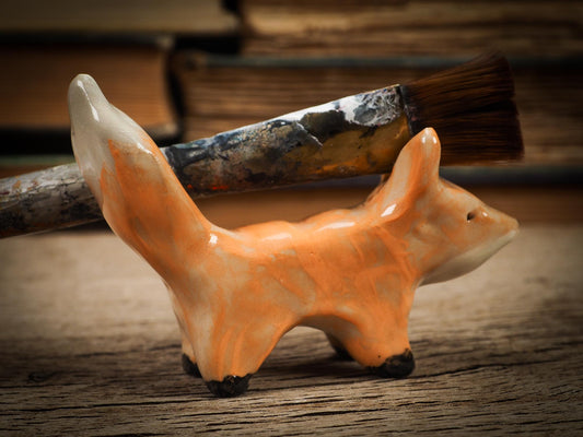 Original handmade ceramic artist color pencil brush holder red fox by Idania Salcido, Danita Art. Unique ceramic art designed and hand built Idania Salcido beautiful handmade touch to any artist's studio with handmade glazed ceramic good for watercolors acrylics inks and oil paints. Clean with water or mineral spirits.