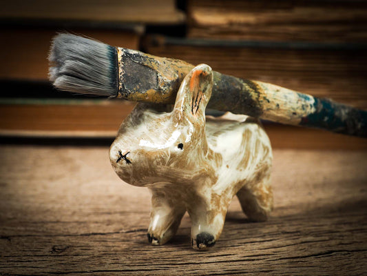 Original handmade ceramic artist color pencil brush holder rabbit by Idania Salcido, Danita Art. Unique ceramic art designed and hand built Idania Salcido beautiful handmade touch to any artist's studio with handmade glazed ceramic good for watercolors acrylics inks and oil paints. Clean with water or mineral spirits.