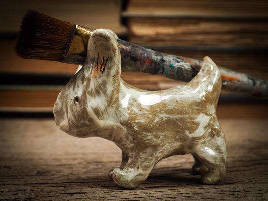 Original handmade ceramic artist color pencil brush holder rabbit by Idania Salcido, Danita Art. Unique ceramic art designed and hand built Idania Salcido beautiful handmade touch to any artist's studio with handmade glazed ceramic good for watercolors acrylics inks and oil paints. Clean with water or mineral spirits.