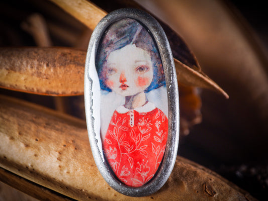 An original, one of a kind handmade jewelry by Idania Salcido, the artist behind Danita Art. Adjustable ring to different finger sizes, the oval image will create a statement of boldness and confidence that will draw looks and attention to your hands when you wear this powerful little piece with one of my favorite image.