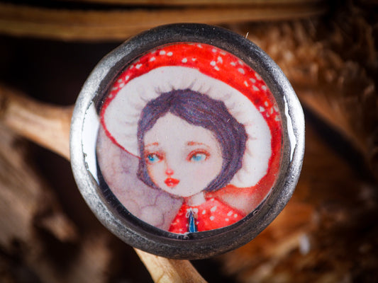 An original, one of a kind handmade jewelry by Idania Salcido, the artist behind Danita Art. Adjustable ring to different finger sizes, the oval image will create a statement of boldness and confidence that will draw looks and attention to your hands when you wear this powerful little piece with one of my favorite image.