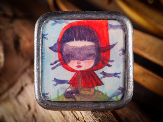 An original, one of a kind handmade jewelry by Idania Salcido, the artist behind Danita Art. Adjustable ring to different finger sizes, the oval image will create a statement of boldness and confidence that will draw looks and attention to your hands when you wear this powerful little piece with one of my favorite image.