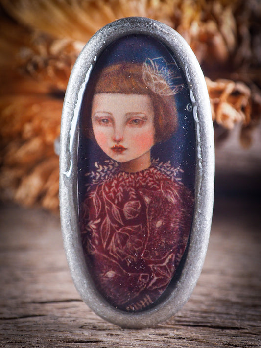 An original, one of a kind handmade jewelry by Idania Salcido, the artist behind Danita Art. Adjustable ring to different finger sizes, the oval image will create a statement of boldness and confidence that will draw looks and attention to your hands when you wear this powerful little piece with one of my favorite image.