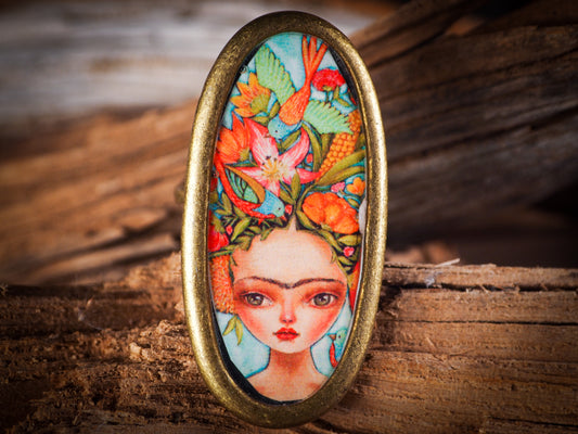 An original, one of a kind handmade jewelry by Idania Salcido, the artist behind Danita Art. Adjustable ring to different finger sizes, the oval image will create a statement of boldness and confidence that will draw looks and attention to your hands when you wear this powerful little piece with one of my favorite image.