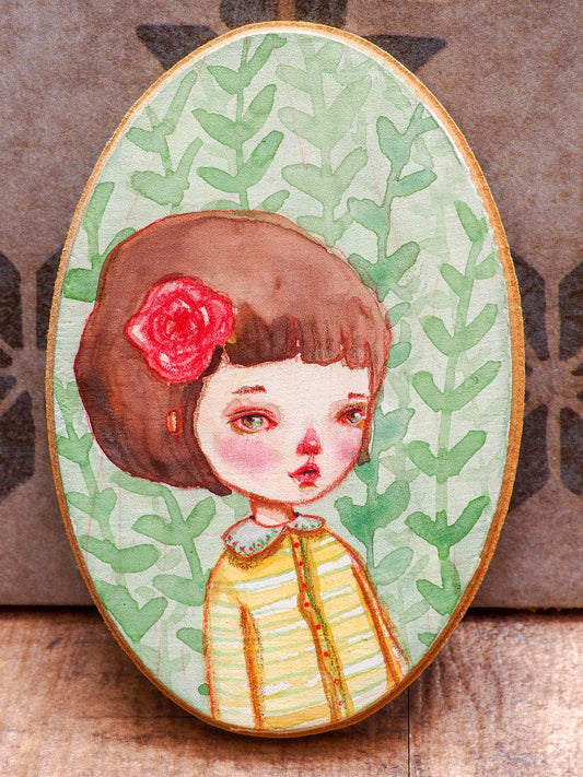 Continuing with Danita's series of watercolor portraits in wood, I painted this beautiful brunette with a red rose in her hair. The painting measures 5 x 3 inches on a wood panel, painted using saturated watercolor pigments and my signature melancholic eyes on her face. She has a friend you can adopt too!