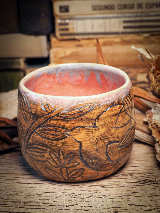 This handmade carved ceramic coffee mug was created by me, Idania Salcido, the artist behind Danita Art, and fired and glazed on my own kiln. The inside is a beautiful combination of pink and blue glazes, swirling and combining inside like cream and coffee. Carved birds fly over a field, free and going far, far away.