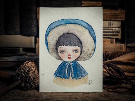 This series of original watercolors portraits by me, Idania Salcido, the artist behind Danita Art, depicts a group of faeries, or maybe girls, playing as mushrooms, with their caps as hats, my signature beautiful and expressive eyes, and capes as their clothes. They are ready to be framed as soon as they arrive!