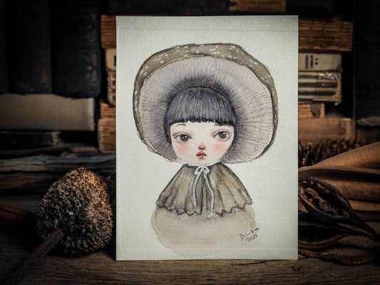 This series of original watercolors portraits by me, Idania Salcido, the artist behind Danita Art, depicts a group of faeries, or maybe girls, playing as mushrooms, with their caps as hats, my signature beautiful and expressive eyes, and capes as their clothes. They are ready to be framed as soon as they arrive!