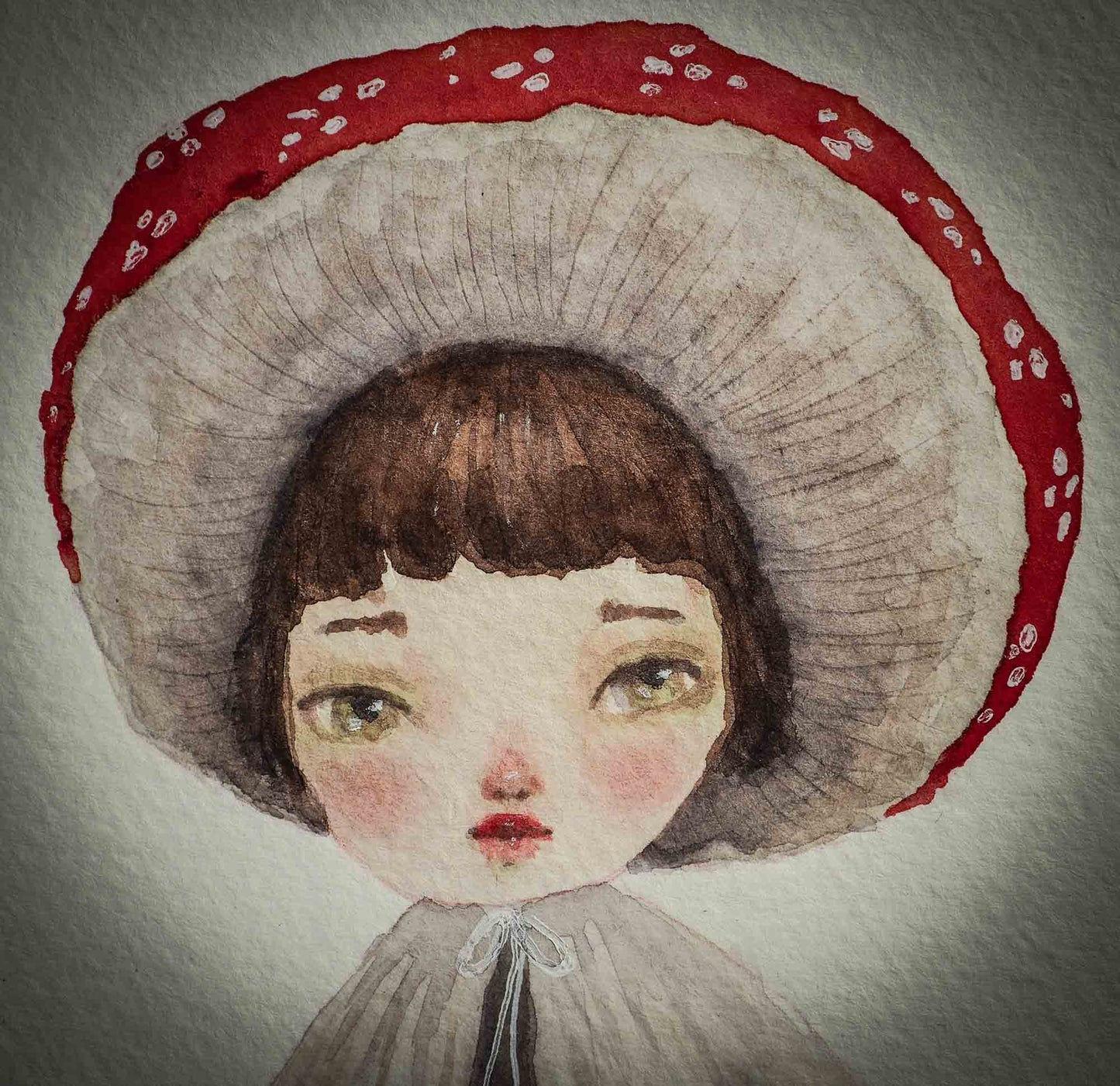 This series of original watercolors portraits by me, Idania Salcido, the artist behind Danita Art, depicts a group of faeries, or maybe girls, playing as mushrooms, with their caps as hats, my signature beautiful and expressive eyes, and capes as their clothes. They are ready to be framed as soon as they arrive!