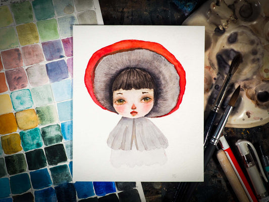 This series of original watercolors portraits by me, Idania Salcido, the artist behind Danita Art, depicts a group of faeries, or maybe girls, playing as mushrooms, with their caps as hats, my signature beautiful and expressive eyes, and capes as their clothes. They are ready to be framed as soon as they arrive!