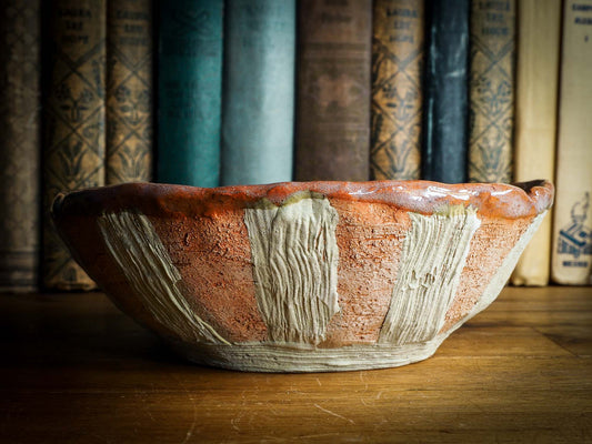 An original Idania Salcido Danita Art pinched ceramic white cat pet food bowl. Handmade from locally foraged clay, this glazed ceramics one of a kind artwork is perfect for any kitchen plate and bowls unique collection. A hand made black cat waits for you at the bottom of this brown and green striped pet food bowl.