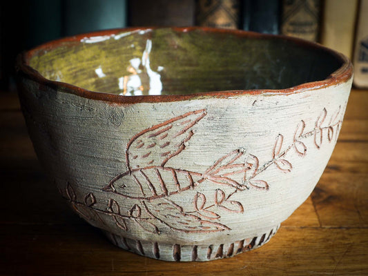 An original Idania Salcido Danita Art pinched ceramic cat pet food bowl. Handmade from locally foraged clay, this glazed ceramics one of a kind artwork is perfect for any kitchen plate and bowls unique collection. Thumbprints and intentionally irregular shape give the bowl a cozy, warmly familiar feel when you pick it