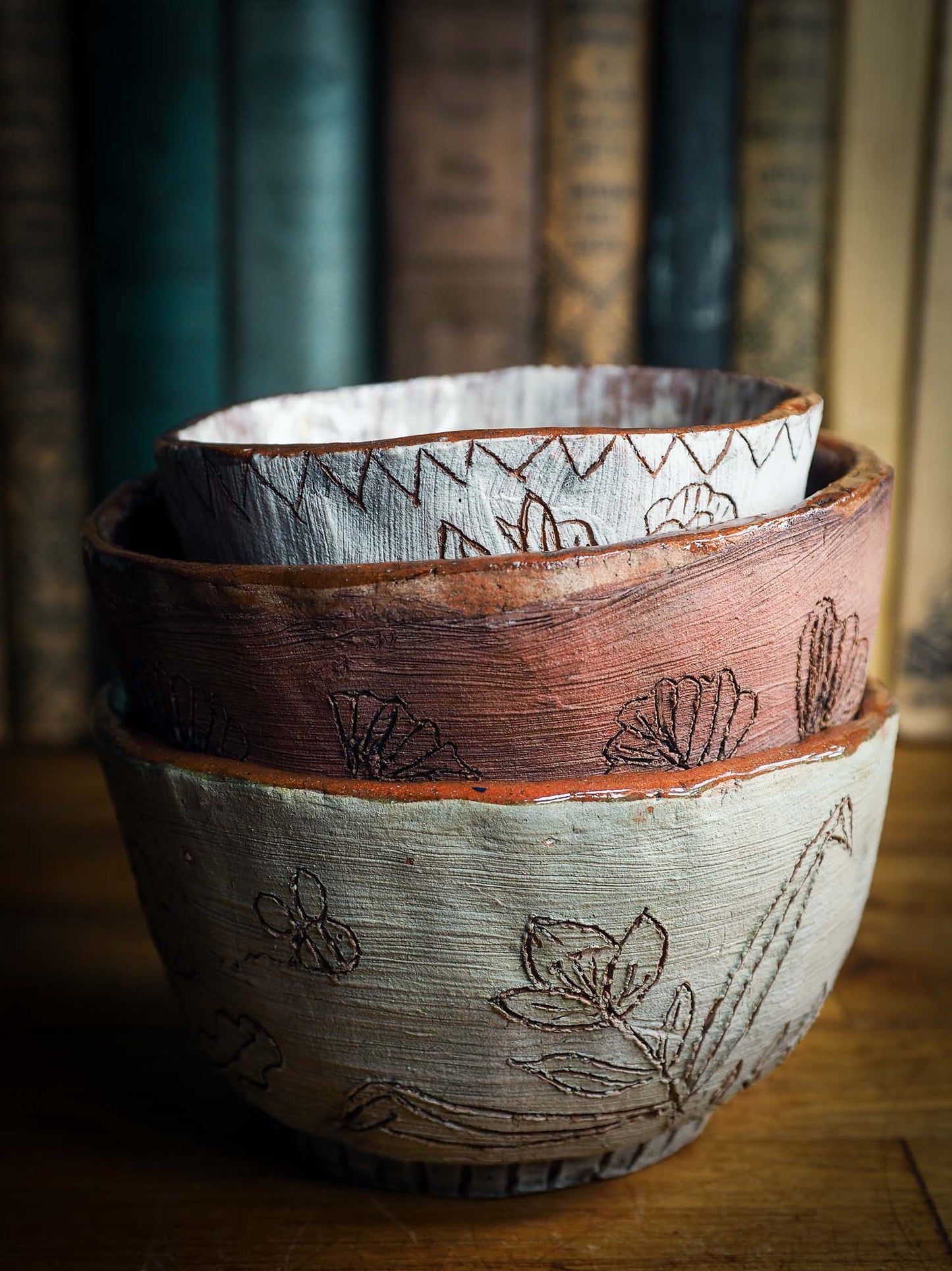 An original Idania Salcido Danita Art pinched ceramic cat pet food bowl. Handmade from locally foraged clay, this glazed ceramics one of a kind artwork is perfect for any kitchen plate and bowls unique collection. Thumbprints and intentionally irregular shape give the bowl a cozy, warmly familiar feel when you pick it.