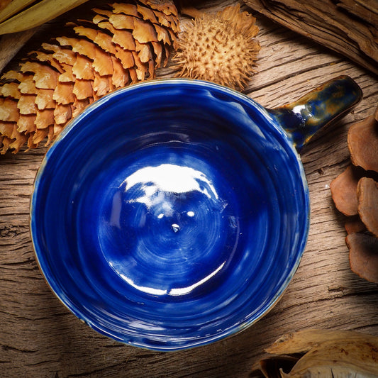 An original Frida Kahlo inspired fire glazed ceramic handmade piece by Idania Salcido, the artist behind Danita Art. Glazed, carved sgraffito stoneware, hand painted and decorated, it is illustrated by hand with the face and iconic unibrow ofFrida Kahlo, in a new artistic interpretation on the style of Danita Art.