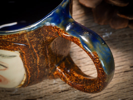 An original Frida Kahlo inspired fire glazed ceramic handmade piece by Idania Salcido, the artist behind Danita Art. Glazed, carved sgraffito stoneware, hand painted and decorated, it is illustrated by hand with the face and iconic unibrow ofFrida Kahlo, in a new artistic interpretation on the style of Danita Art.