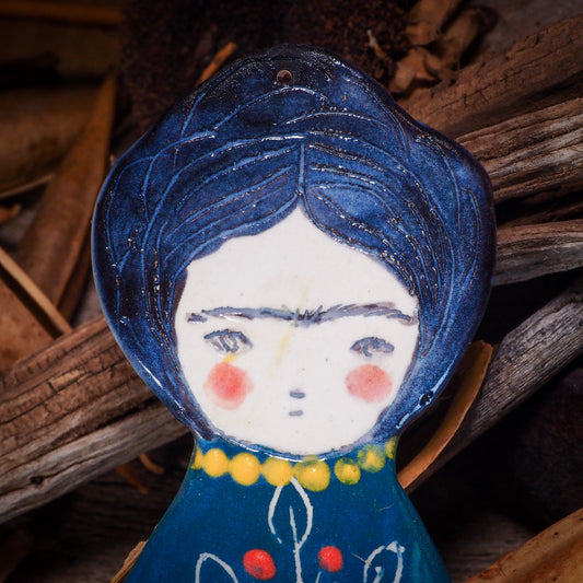 An original Christmas Holiday tree glazed ceramic ornament handmade by Idania Salcido, the artist behind Danita Art. Glazed carved sgraffito stoneware, hand painted and decorated, it is illustrated by hand with Frida Kahlo, Mexican motifs and bold, bright and colorful ceramic glazes.