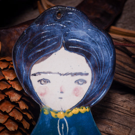 An original Christmas Holiday tree glazed ceramic ornament handmade by Idania Salcido, the artist behind Danita Art. Glazed carved sgraffito stoneware, hand painted and decorated, it is illustrated by hand with Frida Kahlo, Mexican motifs and bold, bright and colorful ceramic glazes.