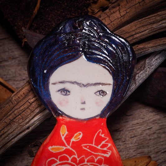 An original Christmas Holiday tree glazed ceramic ornament handmade by Idania Salcido, the artist behind Danita Art. Glazed carved sgraffito stoneware, hand painted and decorated, it is illustrated by hand with Frida Kahlo, Mexican motifs and bold, bright and colorful ceramic glazes.