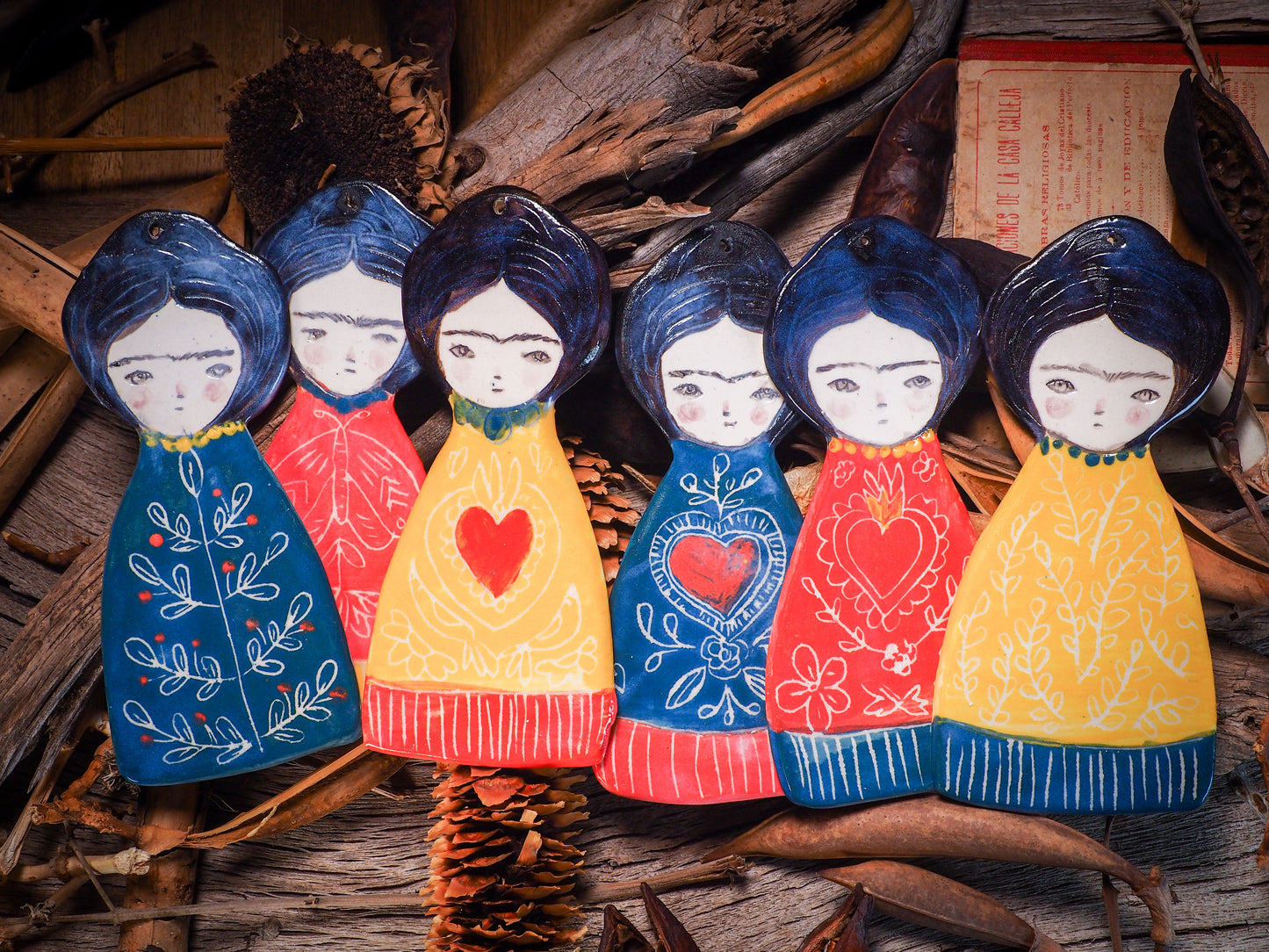 An original Christmas Holiday tree glazed ceramic ornament handmade by Idania Salcido, the artist behind Danita Art. Glazed carved sgraffito stoneware, hand painted and decorated, it is illustrated by hand with Frida Kahlo, Mexican motifs and bold, bright and colorful ceramic glazes.