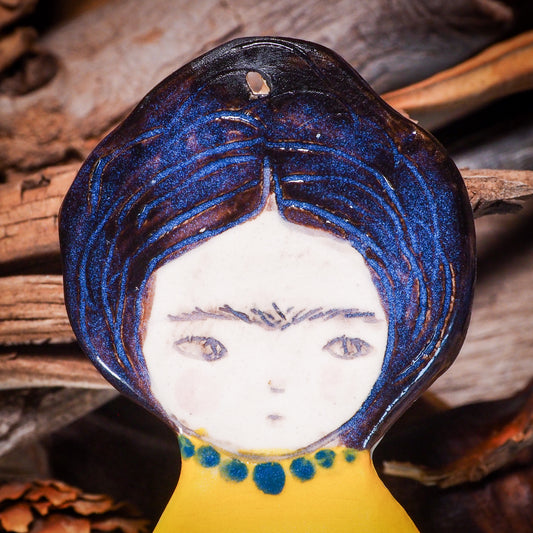 An original Christmas Holiday tree glazed ceramic ornament handmade by Idania Salcido, the artist behind Danita Art. Glazed carved sgraffito stoneware, hand painted and decorated, it is illustrated by hand with Frida Kahlo, Mexican motifs and bold, bright and colorful ceramic glazes.