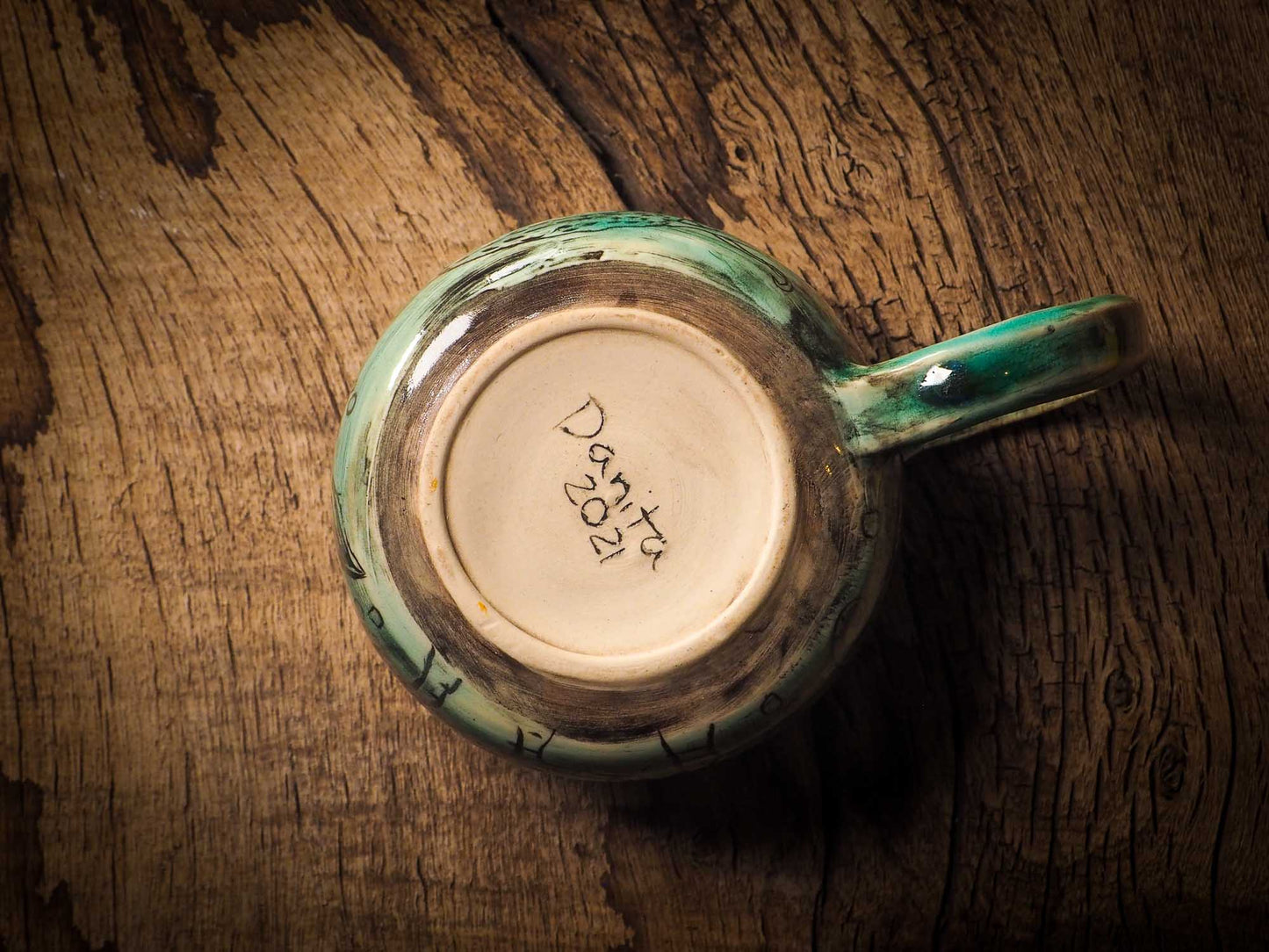 This is a handmade ceramic coffee or tea mug, create entirely by Idania Salcido, the artist behind Danita Art. The mermaid swimming on this mug is hand painted before glazing it and firing it on my very own kiln. It will be perfect for driving your favorite coffee or tea, in company of a beautiful mermaid.