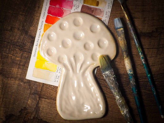 Each artist paint palette by Idania Salcido, the artist behind Danita Art, is hand sculpted and fired with paint and scratch resistant glazes and with enough paint wells to keep and mix colors at ease. Acrylics, Oils and watercolors can be used, it is perfect for any medium! Clean with water or mineral spirits.