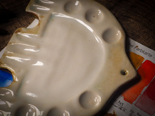 Each artist paint glazed ceramic palette by Idania Salcido, the artist behind Danita Art, is hand sculpted and fired with paint and scratch resistant glazes and with enough paint wells to keep and mix colors at ease. Acrylics, Oils and watercolors can be used, it is perfect for any medium! Clean with water or mineral spirits.