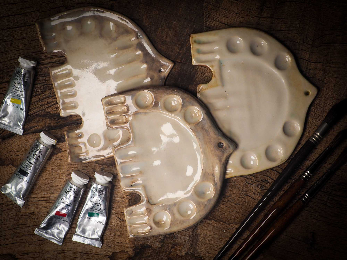 Each artist paint glazed ceramic palette by Idania Salcido, the artist behind Danita Art, is hand sculpted and fired with paint and scratch resistant glazes and with enough paint wells to keep and mix colors at ease. Acrylics, Oils and watercolors can be used, it is perfect for any medium! Clean with water or mineral spirits.