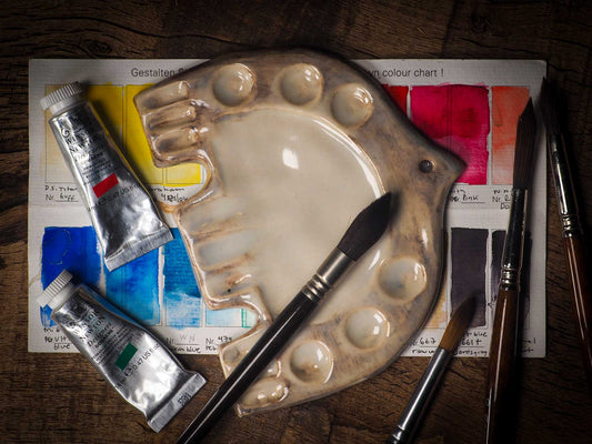 Each artist paint glazed ceramic palette by Idania Salcido, the artist behind Danita Art, is hand sculpted and fired with paint and scratch resistant glazes and with enough paint wells to keep and mix colors at ease. Acrylics, Oils and watercolors can be used, it is perfect for any medium! Clean with water or mineral spirits.