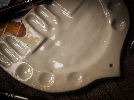 Each artist paint glazed ceramic palette by Idania Salcido, the artist behind Danita Art, is hand sculpted and fired with paint and scratch resistant glazes and with enough paint wells to keep and mix colors at ease. Acrylics, Oils and watercolors can be used, it is perfect for any medium! Clean with water or mineral spirits.