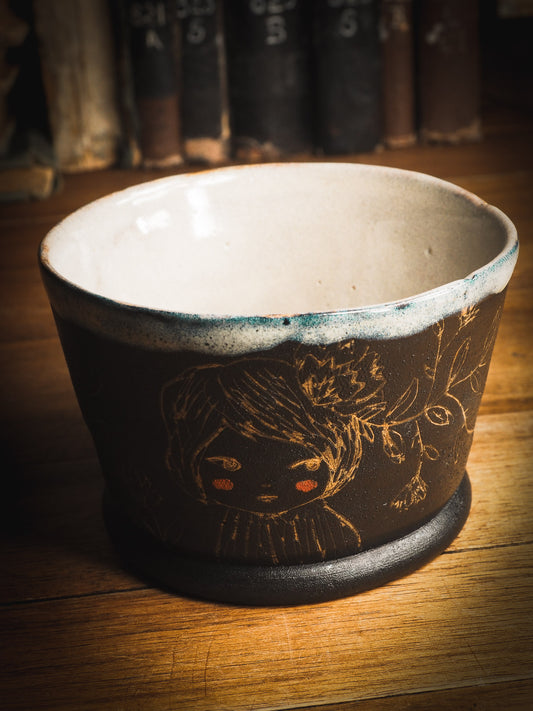 An original Idania Salcido Danita Art ceramic cat pet food plate. Handmade from stoneware, this glazed ceramics one of a kind artwork is perfect for any kitchen plate and bowls unique collection. Thumbprints and intentionally irregular shape give the bowl a cozy, warmly familiar feel when you pick it. I LOVE This piece, with it's golden drawings and it's deep black chocolate brown color contrasting with the icy white glaze on top.