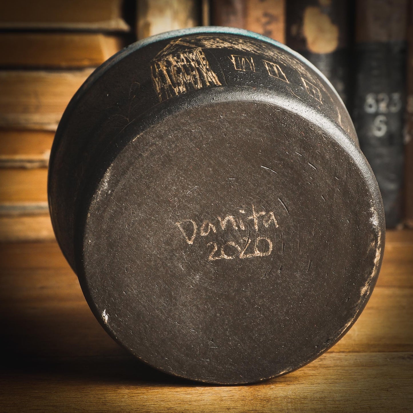 An original Idania Salcido Danita Art ceramic cat pet food plate. Handmade from stoneware, this glazed ceramics one of a kind artwork is perfect for any kitchen plate and bowls unique collection. Thumbprints and intentionally irregular shape give the bowl a cozy, warmly familiar feel when you pick it. I LOVE This piece, with it's golden drawings and it's deep black chocolate brown color contrasting with the icy white glaze on top.