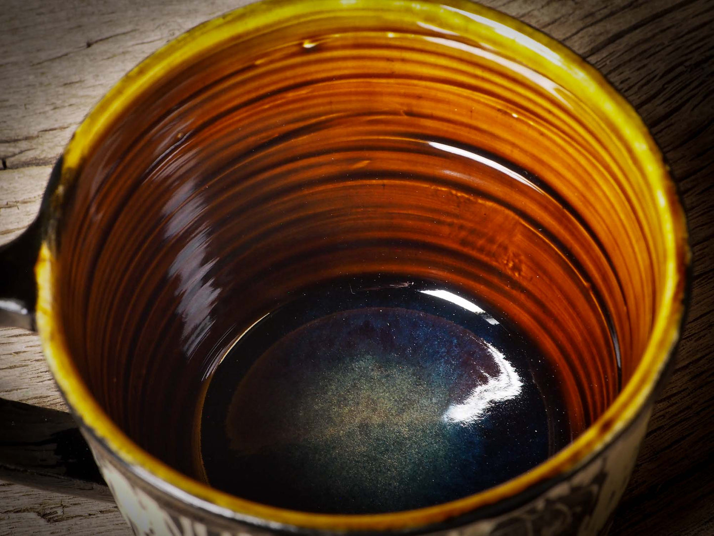 An original Halloween ceramic mug tumbler bowl handmade by Idania Salcido the artist behind Danita Art. Made with wheel thrown clay hand carved and glazed by the artist. Witches, ghosts, goblins, black cats, vampires give a folk art primitive feel to it. Perfect for Halloween Candy, ice cream and fruit, a pet cat bowl.