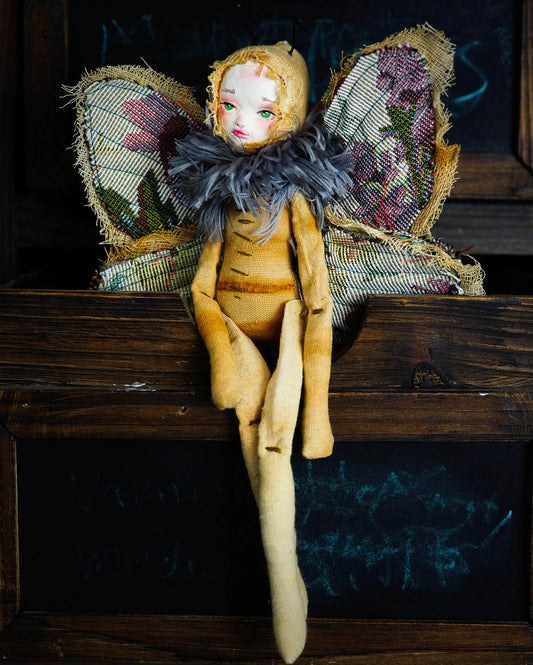 Inspired by nature, Danita created a handmade art doll moth, or night butterfly using organic materials like vintage and hand dyed fabric, wire and clay on a melancholic articulated soft sculpture. An art doll toy that celebrates nature's creations and the beautiful wings of insects with a bit of magic fairy on them.