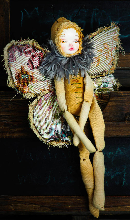 Inspired by nature, Danita created a handmade art doll moth, or night butterfly using organic materials like vintage and hand dyed fabric, wire and clay on a melancholic articulated soft sculpture. An art doll toy that celebrates nature's creations and the beautiful wings of insects with a bit of magic fairy on them.