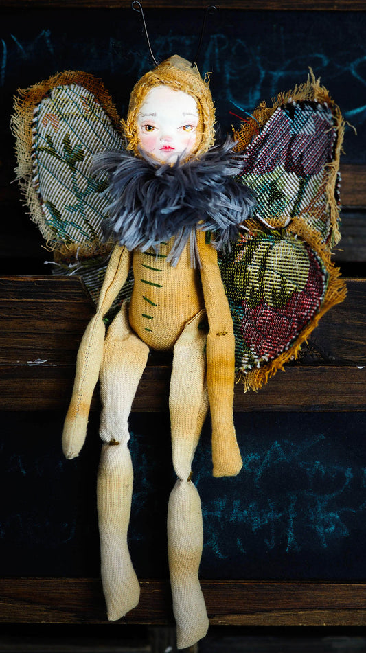 Inspired by nature, Danita created a handmade art doll moth, or night butterfly using organic materials like vintage and hand dyed fabric, wire and clay on a melancholic articulated soft sculpture. An art doll toy that celebrates nature's creations and the beautiful wings of insects with a bit of magic fairy on them.