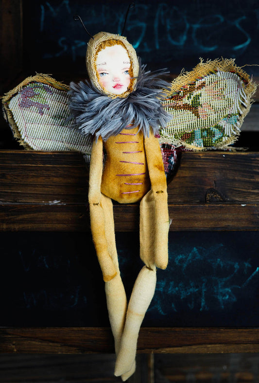 Inspired by nature, Danita created a handmade art doll moth, or night butterfly using organic materials like vintage and hand dyed fabric, wire and clay on a melancholic articulated soft sculpture. An art doll toy that celebrates nature's creations and the beautiful wings of insects with a bit of magic fairy on them.