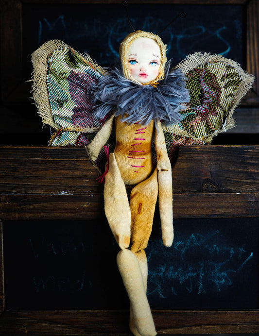 Inspired by nature, Danita created a handmade art doll moth, or night butterfly using organic materials like vintage and hand dyed fabric, wire and clay on a melancholic articulated soft sculpture. An art doll toy that celebrates nature's creations and the beautiful wings of insects with a bit of magic fairy on them.