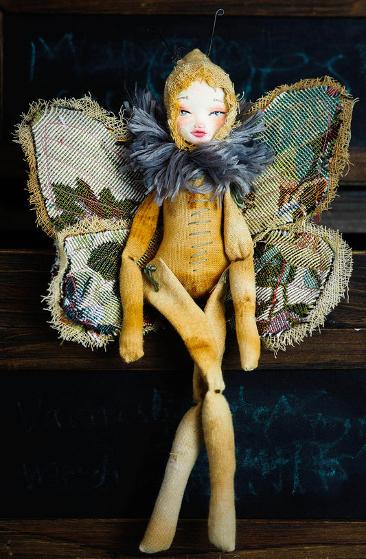 Inspired by nature, Danita created a handmade art doll moth, or night butterfly using organic materials like vintage and hand dyed fabric, wire and clay on a melancholic articulated soft sculpture. An art doll toy that celebrates nature's creations and the beautiful wings of insects with a bit of magic fairy on them.
