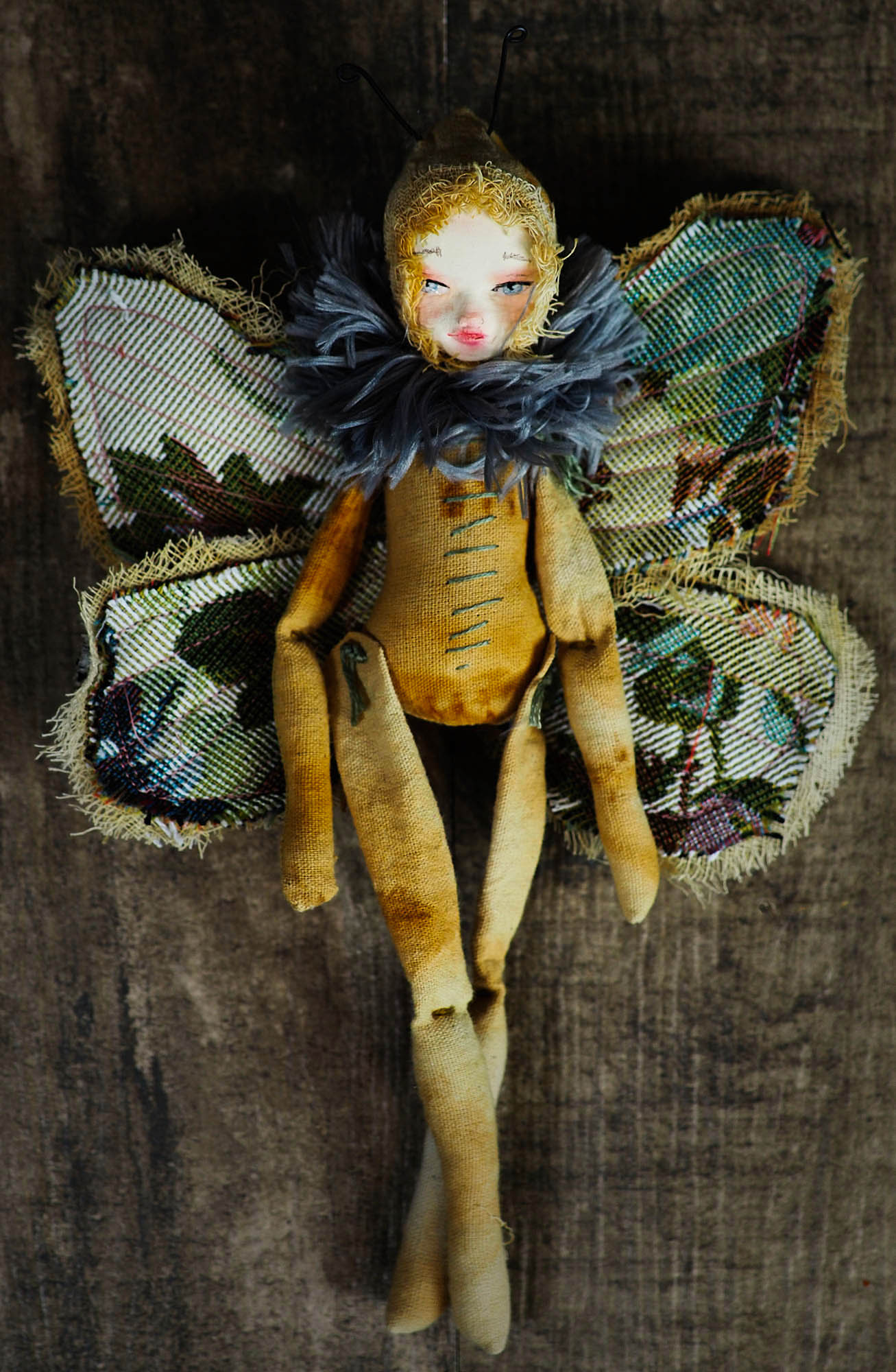 Inspired by nature, Danita created a handmade art doll moth, or night butterfly using organic materials like vintage and hand dyed fabric, wire and clay on a melancholic articulated soft sculpture. An art doll toy that celebrates nature's creations and the beautiful wings of insects with a bit of magic fairy on them.